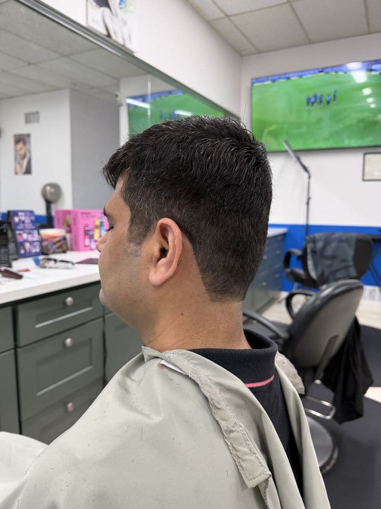Side view of a men's tapered haircut at Dimension Hair Salon in Bothell