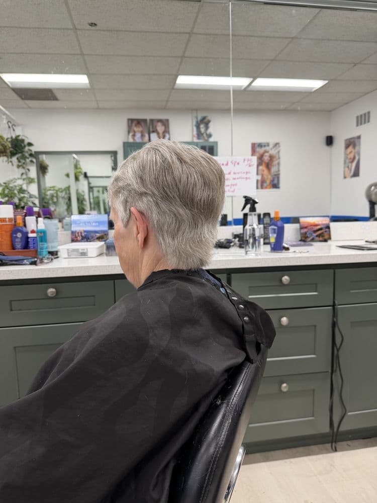 Short gray haircut shaped at Dimension Hair Salon in Bothell