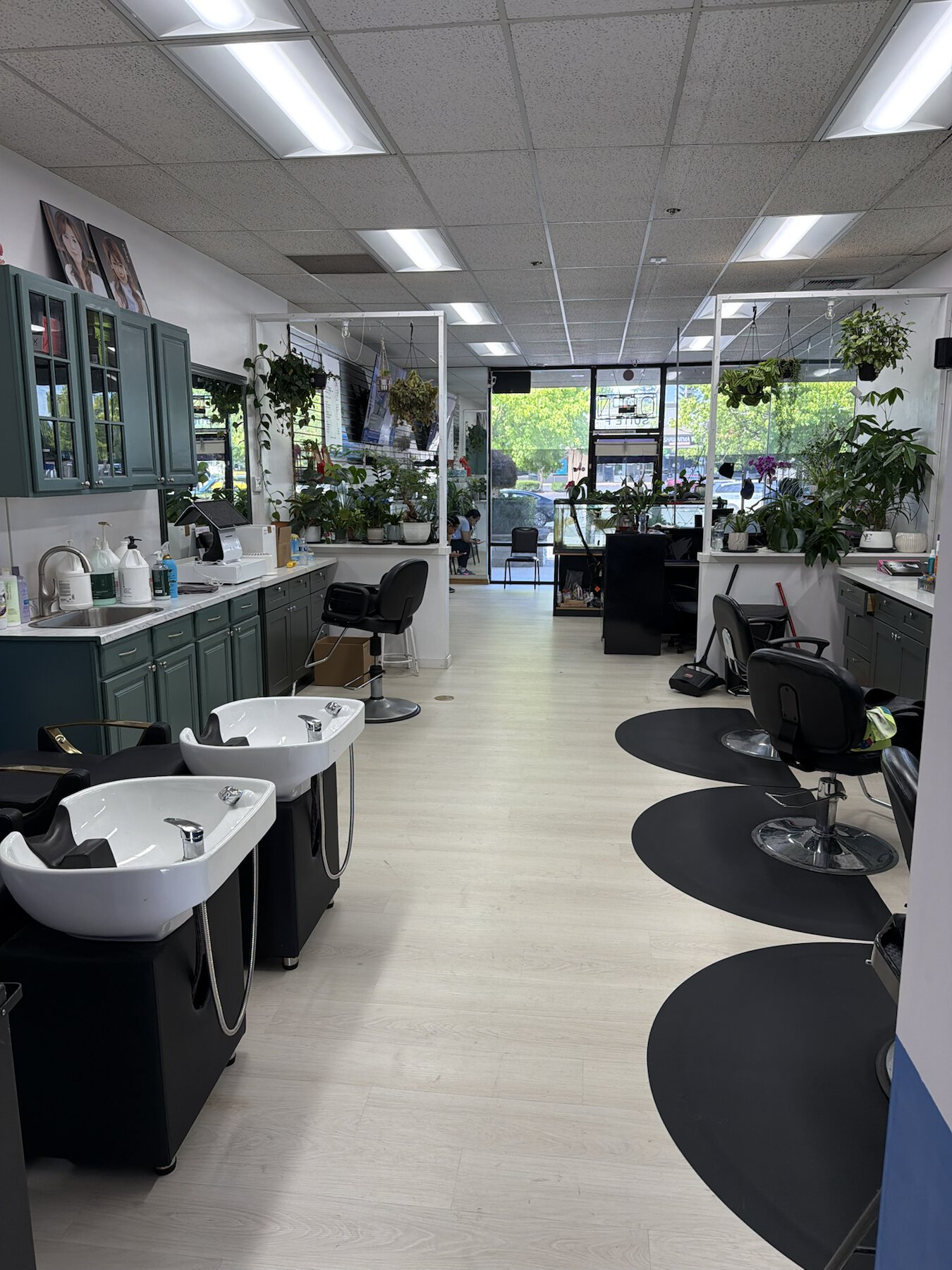 Bright interior and styling stations at Dimension Hair Salon in Bothell