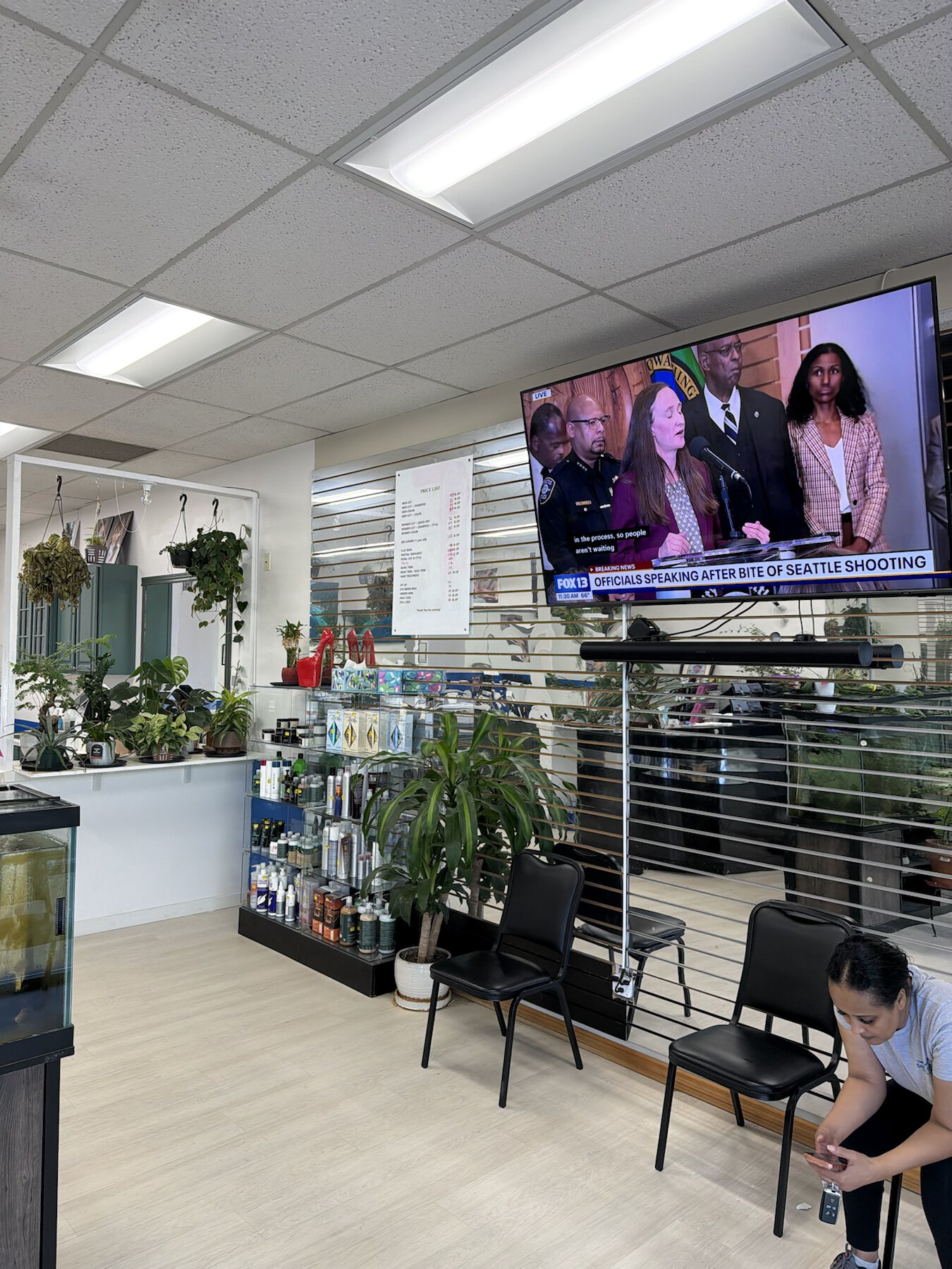 Plant-filled waiting and retail area inside Dimension Hair Salon