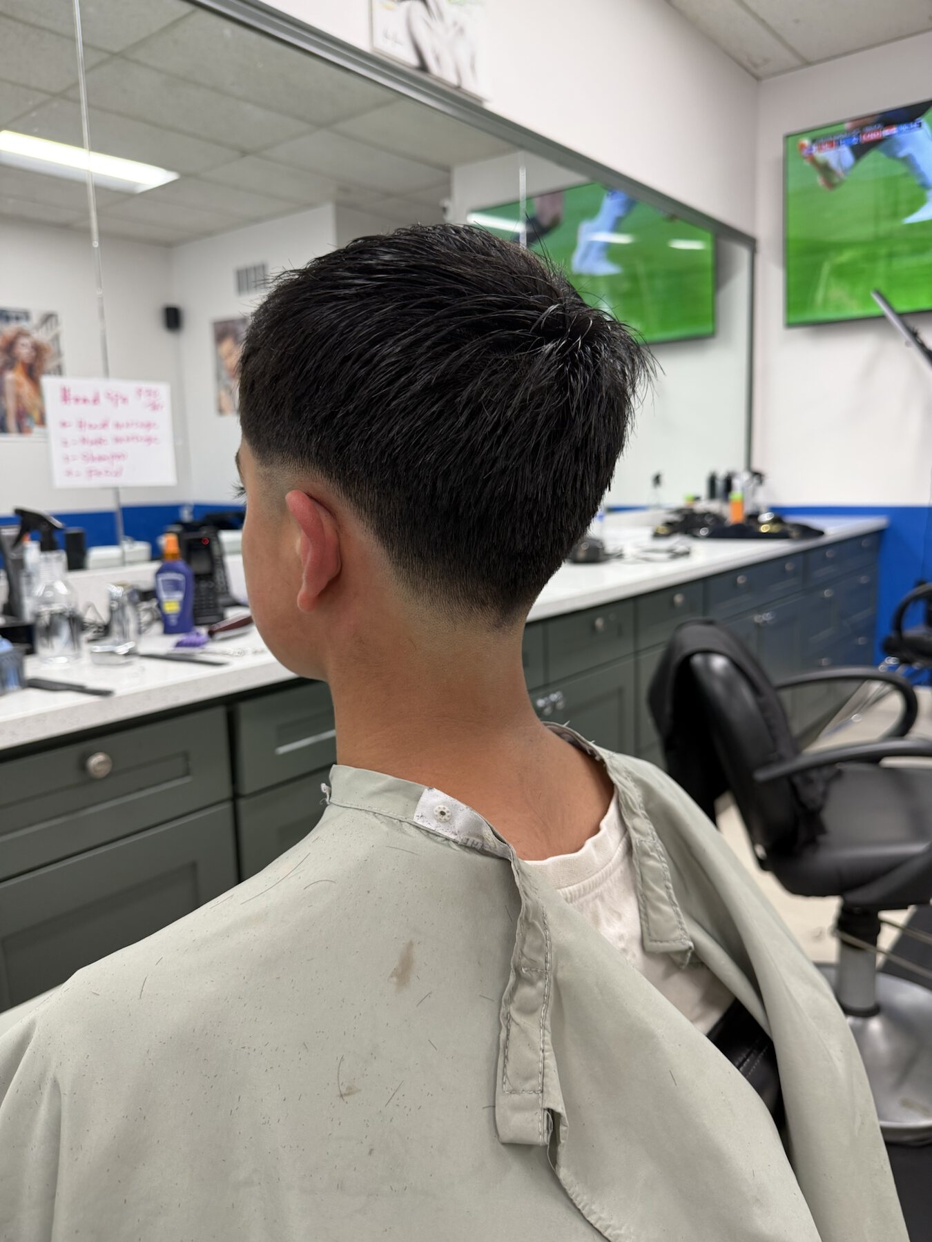 Back view of a men's taper with a clean finish